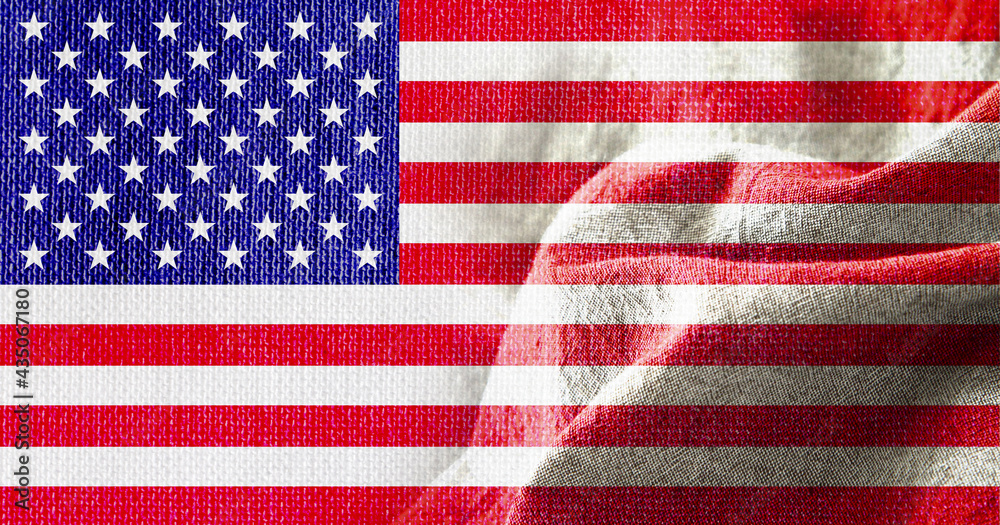 Naklejka premium USA flag in the fabric textile textured background
