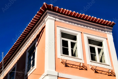 Old colorful typical facade next to the water canal in Aveiro village in Porto