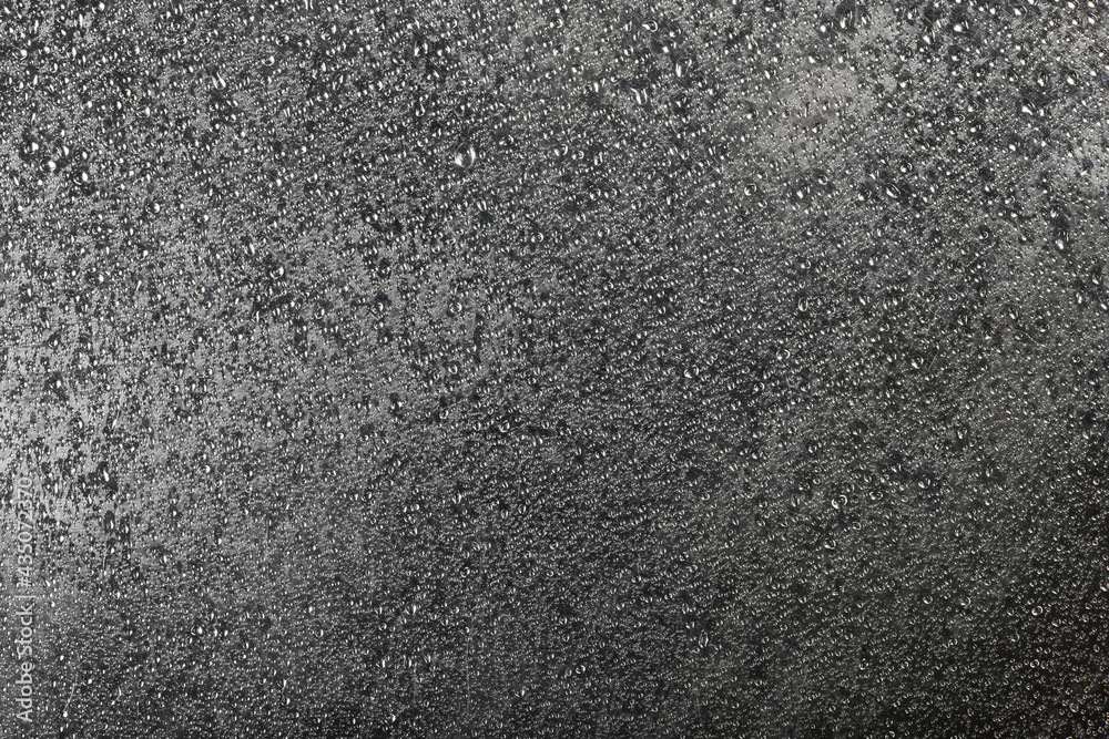 Metallic background or strange metal surface structure with clear water drops texture. High resolution macro close-up for your design. Metallic background or strange metal surface structure with clear water drops texture. High resolution macro close-up for your design.