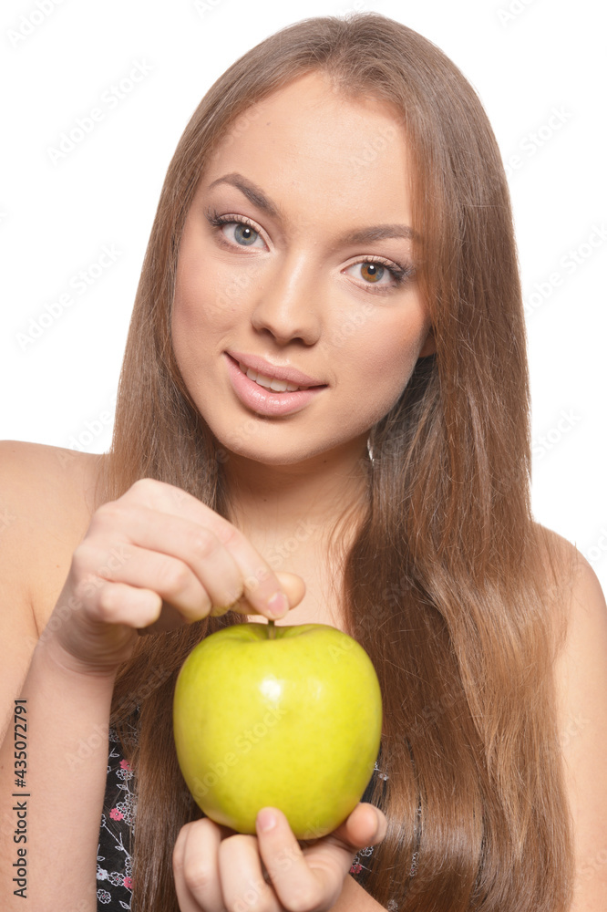 Portrait of beautiful young woman with green apple Portrait of beautiful young woman with green apple