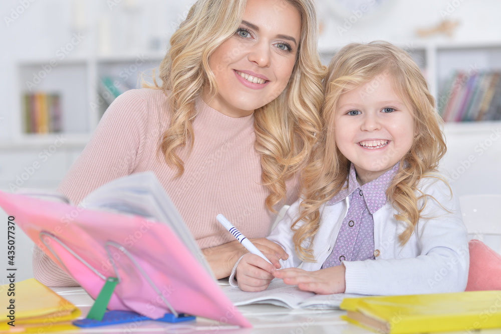 Portrait of a beautiful little cute girl with mother Portrait of a beautiful little cute girl with mother