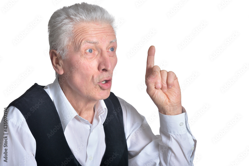 portrait of senior man pointing upward portrait of senior man pointing upward