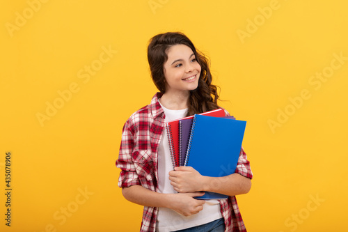 schoolgirl with notebook. back to school. teen girl ready to study. happy childhood. cheerful kid