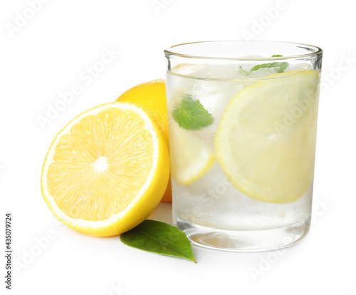 Cool freshly made lemonade and fruits on white background