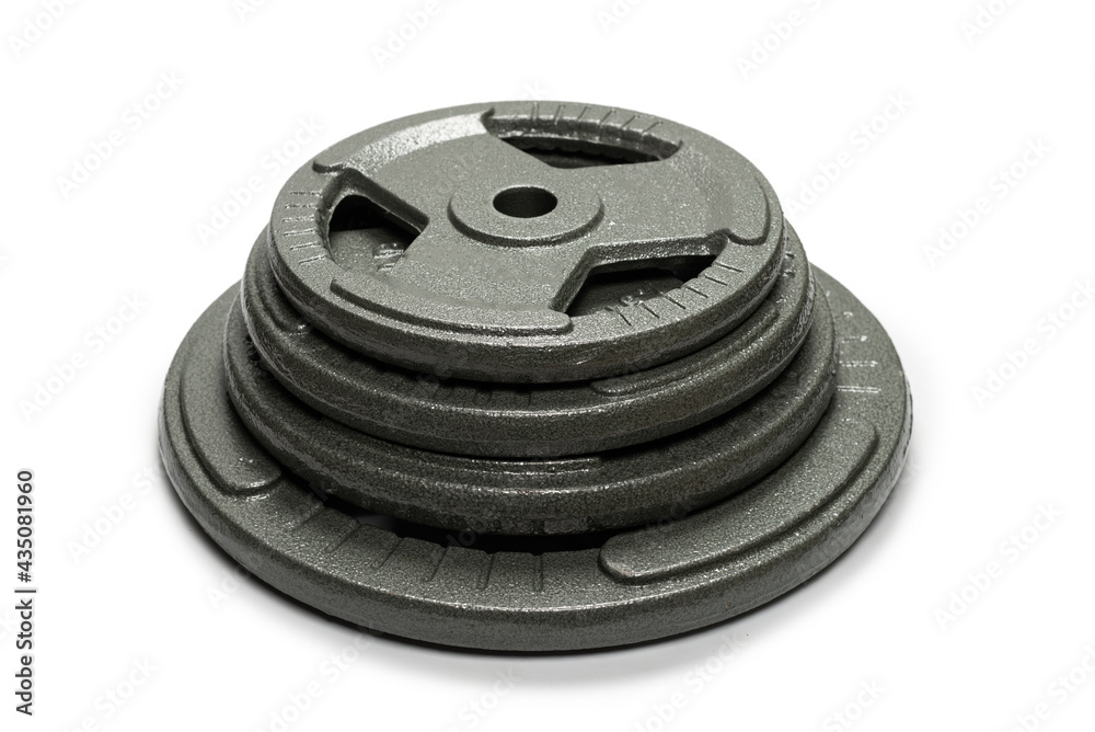Weight plates isolated on a white background. Weight plates isolated on a white background.