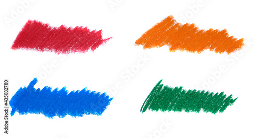 Abstract crayon on white background. Blue, orange, green and red crayon scribble texture.