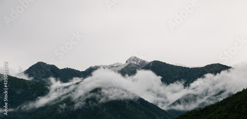 Astonishing view of mountains with clouds over them