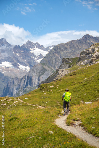 man hiking in the swiss mountains