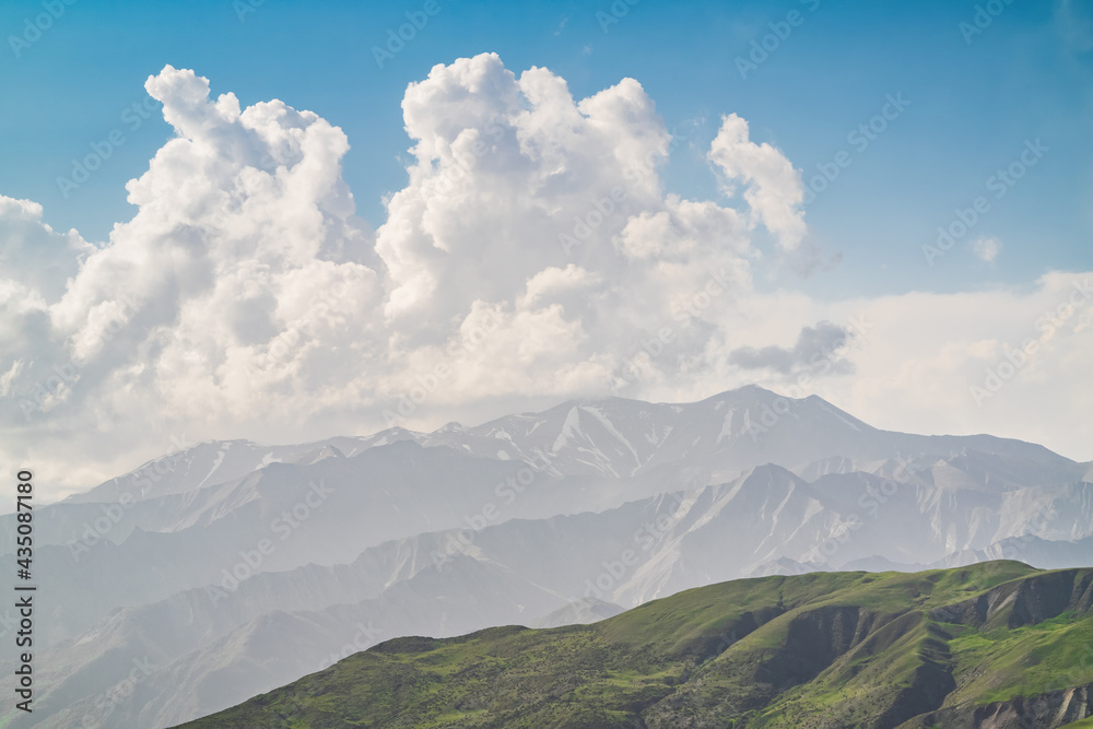 Large cloud over the mountain range