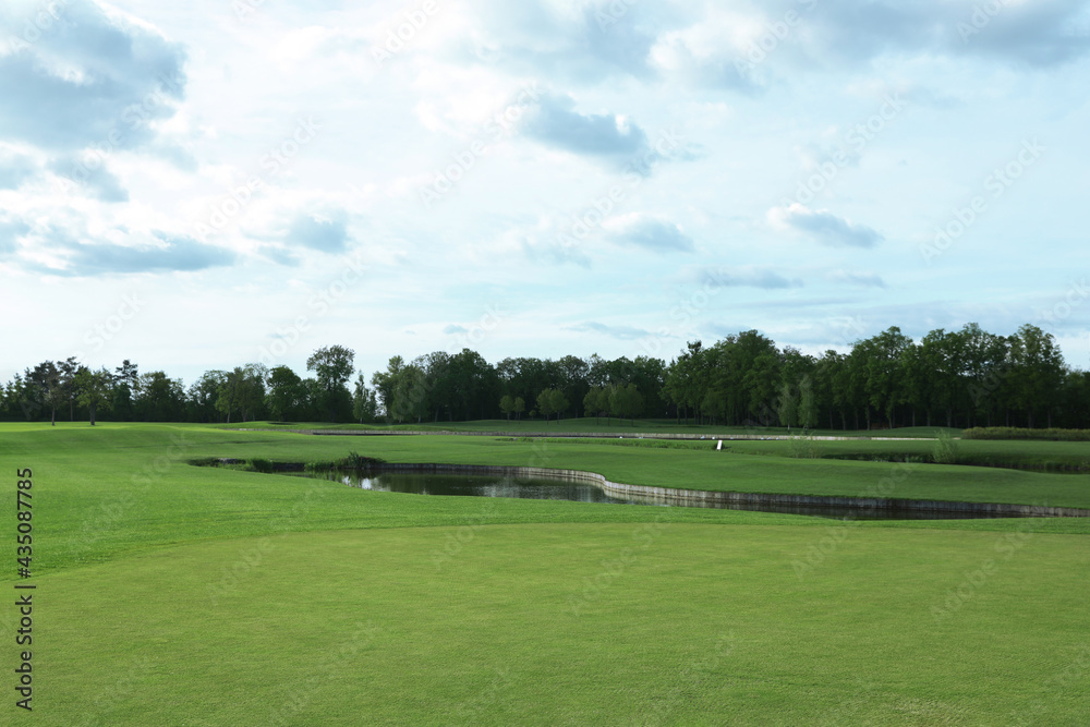 Beautiful view of golf course on sunny day Beautiful view of golf course on sunny day