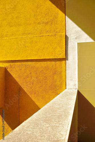 Colorful (Yellow and white) wall as abstract textured background, look like Peacock