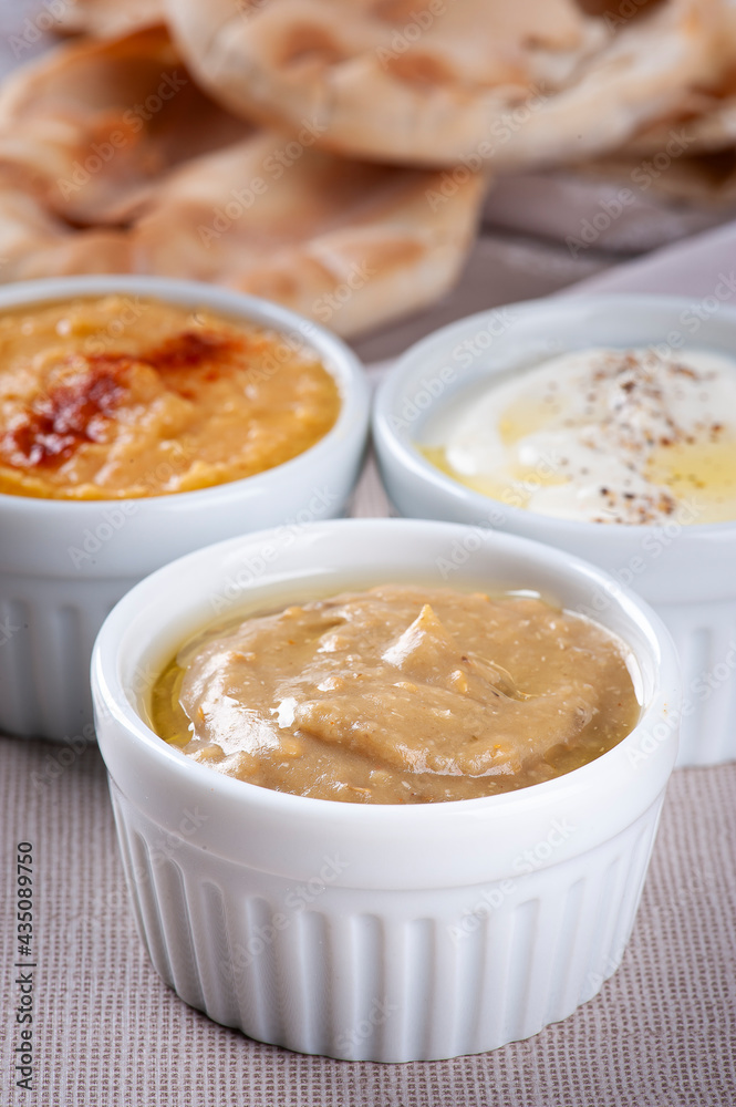 Babaganoush. Smoked eggplant paste, typical of Arab cuisine Babaganoush. Smoked eggplant paste, typical of Arab cuisine