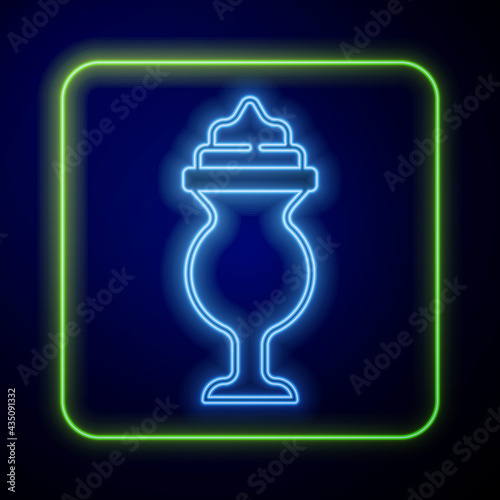 Glowing neon Milkshake icon isolated on blue background. Plastic cup with lid and straw. Vector