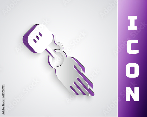 Paper cut Prosthesis hand icon isolated on grey background. Futuristic concept of bionic arm, robotic mechanical hand. Paper art style. Vector