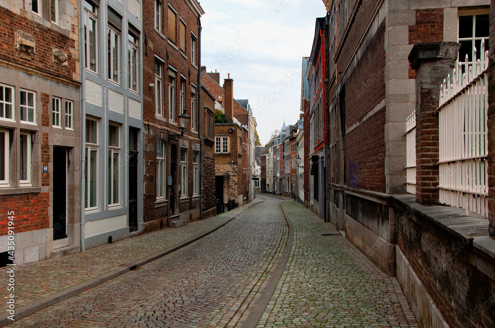 Maastricht, Netherlands - November 8, 2020: Old town street in the center of Maastricht.