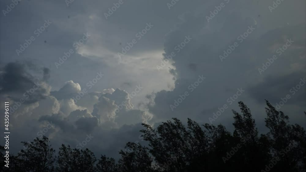 Thunderstorm and Heavy rain on Cloudy grey Sky, Trees bending in the ...