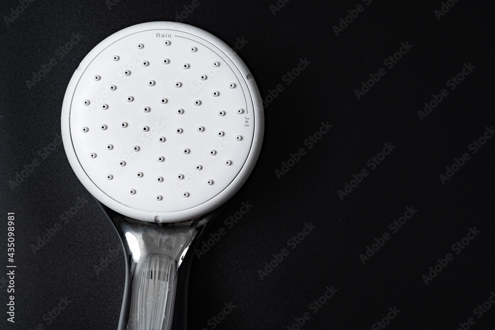 shower head on a black background. shower and bathroom accessories. shower head on a black background. shower and bathroom accessories.