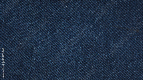 Indigo blue jeans textile for texture and background.