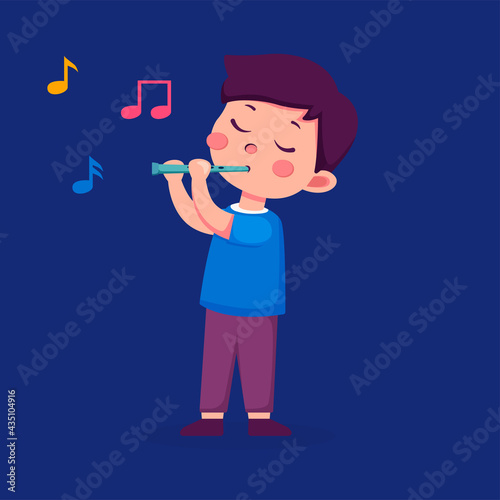 Cute boy playing on a musical instrument recorder