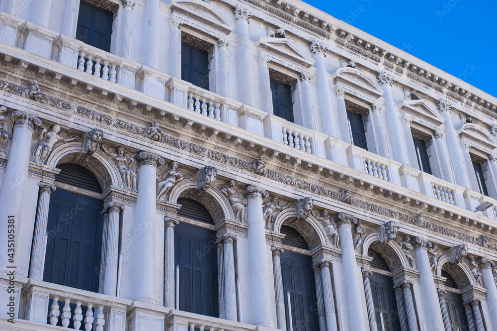 details of facades of square San Marco fresh early morning waiting to be floated with tourists details of facades of square San Marco fresh early morning waiting to be floated with tourists