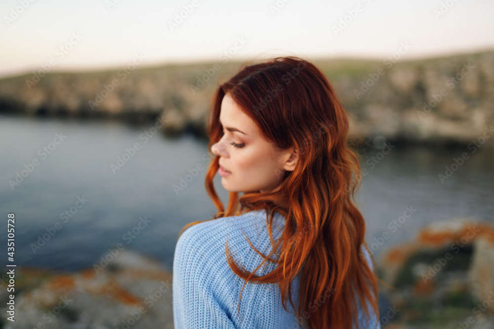 cheerful woman outdoors admiring nature freedom travel landscape