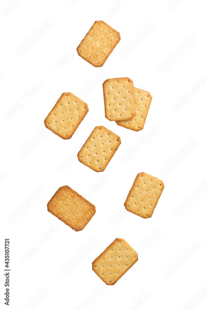 Cracker cookies falling isolated on white background with clipping path. Cracker cookies falling isolated on white background with clipping path.