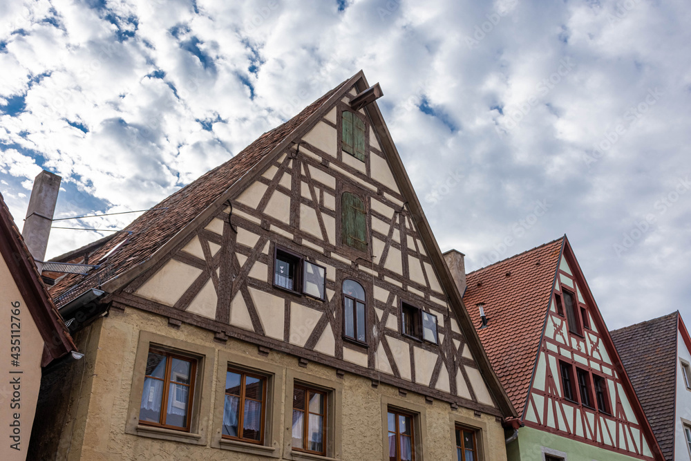 Beautiful half-timbered houses in the historic center of Rothenburg ob  der Tauber, Germany
