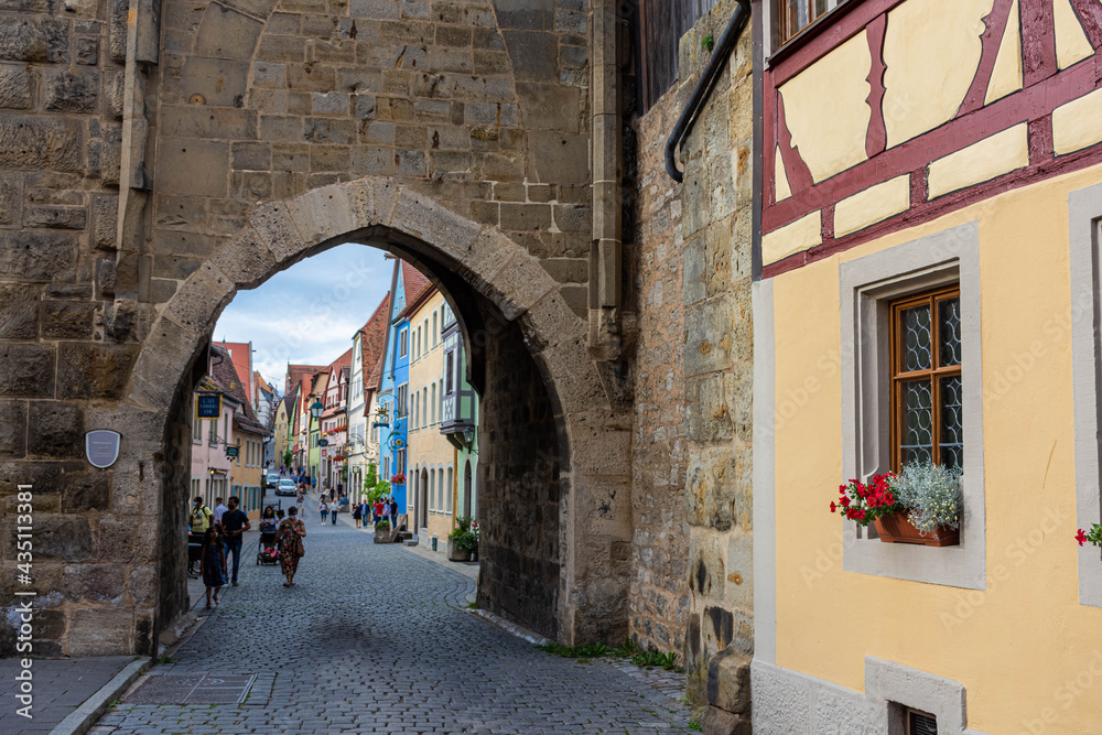 ROTHENBURG OB DER TAUBER, GERMANY, 26 JULY 2020 Colorful houses in the street of the historic center