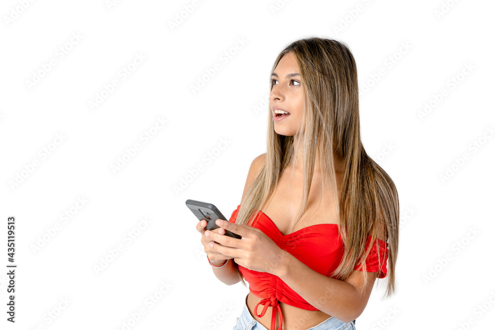 Attractive straight-haired woman with the attitude of thinking a response to a message on a cell phone or smarphone on a pure white background. studio shot Attractive straight-haired woman with the attitude of thinking a response to a message on a cell phone or smarphone on a pure white background. studio shot