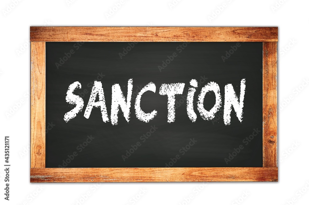 SANCTION text written on wooden frame school blackboard. SANCTION text written on wooden frame school blackboard.
