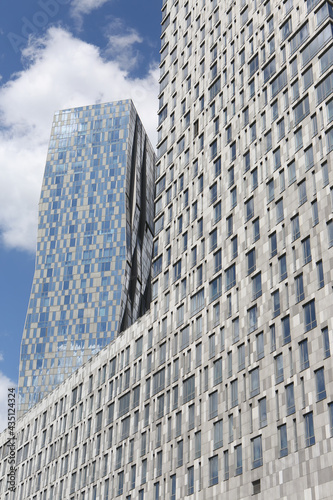 Mosfilm Tower. New building facade in complex Mosfilm Tower, Moscow city, Russia. Contemporary architecture. Facade of house. Moscow architectural landmark. Russian skyscraper on Mosfilmovskaya street photo