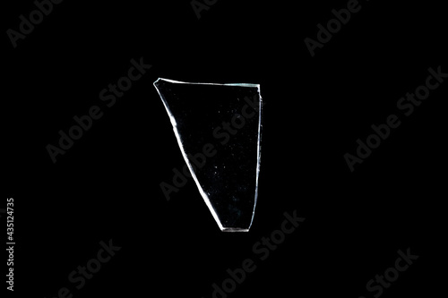Foto glass fragments in isolation on a black background