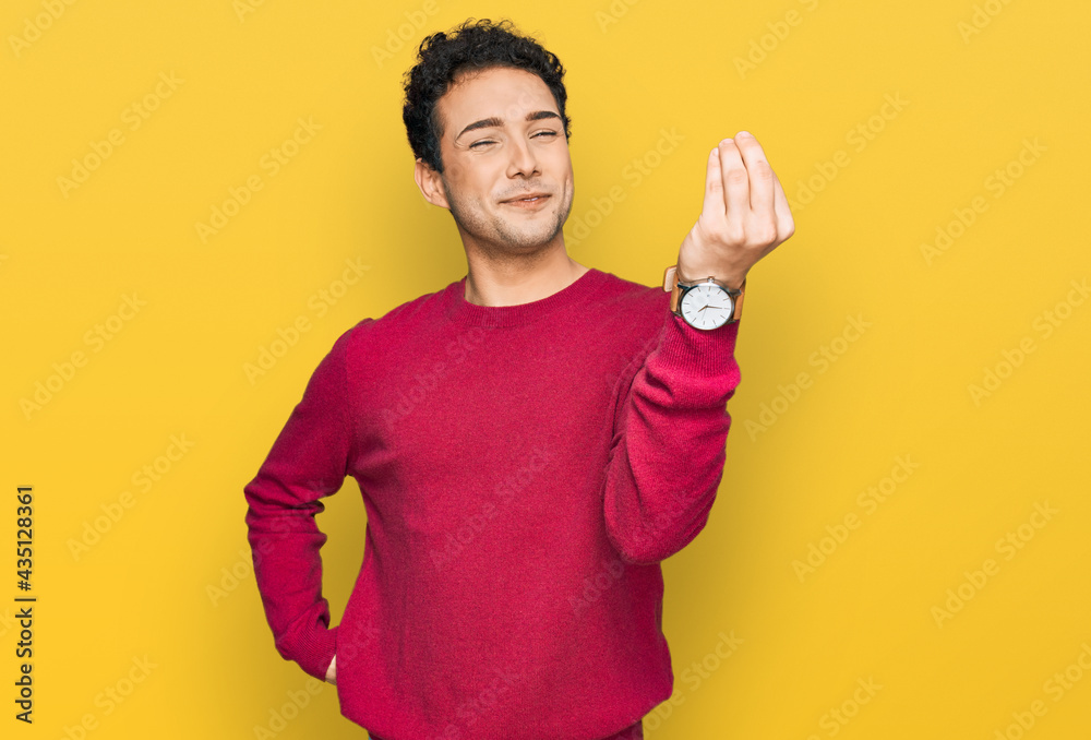 Young handsome man wearing casual clothes doing italian gesture with hand and fingers confident expression Young handsome man wearing casual clothes doing italian gesture with hand and fingers confident expression