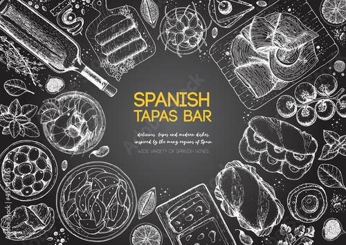 Spanish tapas, top view frame. A set of spanish dishes with bocadillo, jamon, patatas bravas, tapas. Food menu design template. Vintage hand drawn sketch vector illustration. Engraved image.