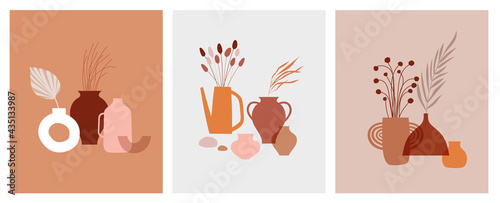 Abstract bohemian art aesthetic design. Arrangements of pottery and ceramic pots, vases with dry leafs, plants, flowers. 