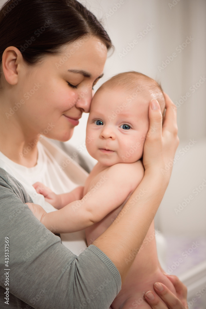 Close up portrait of mother and her newborn baby. Healthcare and medical love woman lifestyle mother's day concept. Close up portrait of mother and her newborn baby. Healthcare and medical love woman lifestyle mother's day concept.