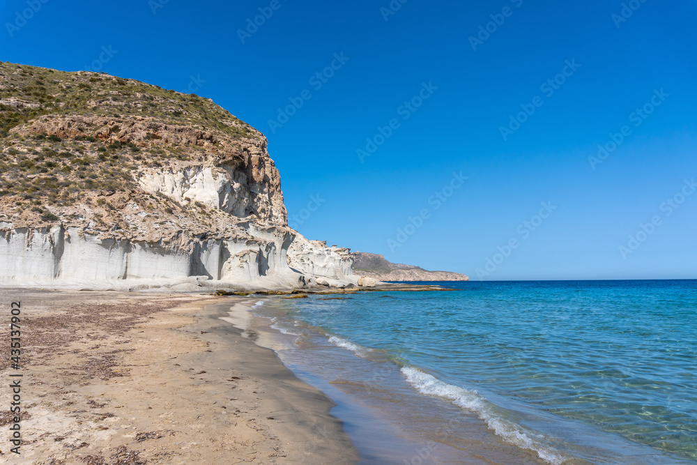 The beautiful Enmedio beach in Cabo de Gata on a beautiful summer day, Almería. Mediterranean sea, spain
