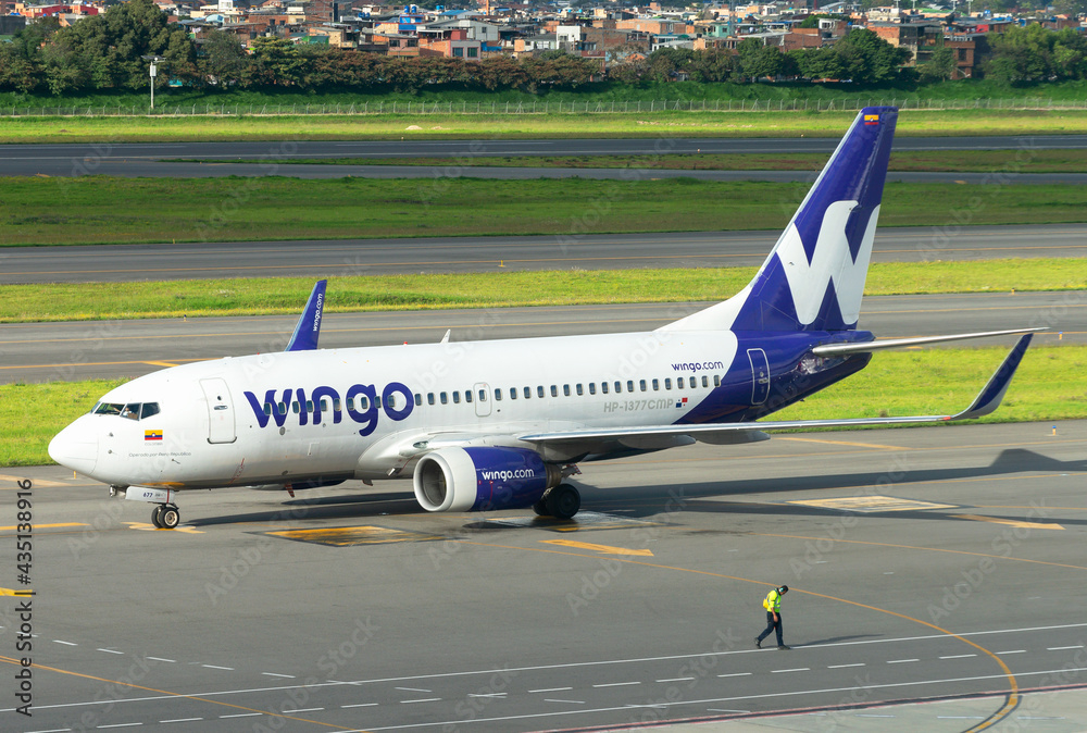 Wingo Boeing 737 at El Dorado International Airport. B737 aircraft operated by Aero Republica
