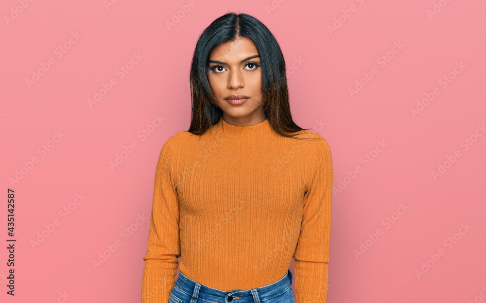 Obraz premium Young latin transsexual transgender woman wearing casual clothes depressed and worry for distress, crying angry and afraid. sad expression.
