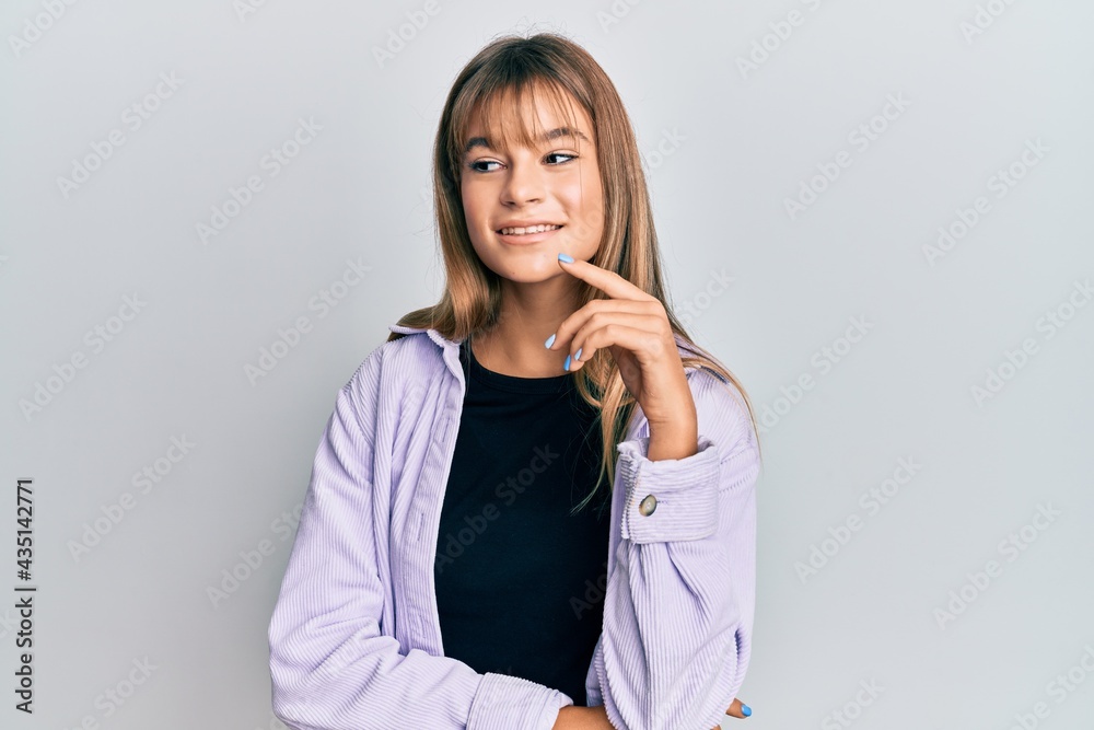 Teenager caucasian girl wearing casual clothes smiling looking confident at the camera with crossed arms and hand on chin. thinking positive.