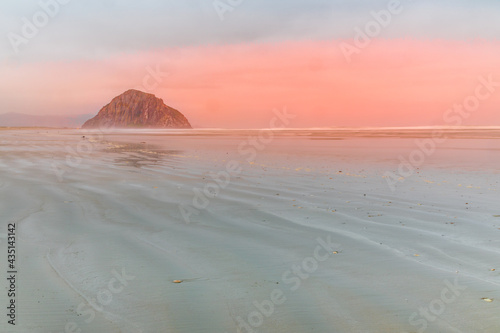 Dreamy morning on the beach of Morro Bay with the Morro Rock, California photo