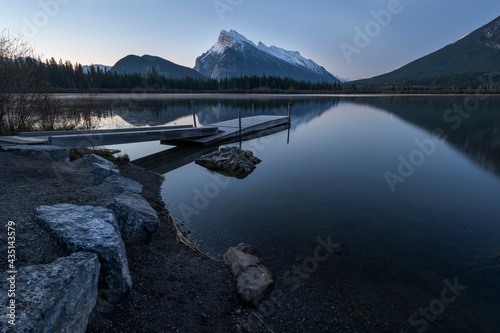 Early morning view of Mount Rundle and boat dock at Vermilion Lakes in Banff National Park, Alberta, Canada photo