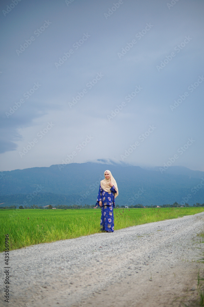 Portrait of Muslim Asian woman posing at paddy field Gunung Jerai, Kedah. Portrait of Muslim Asian woman posing at paddy field Gunung Jerai, Kedah.