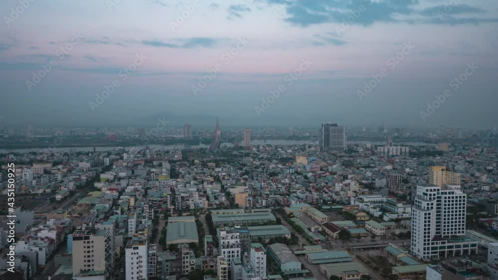 Time-Lapse view of industrialized city from dawn to morning with picturesque view of lights.