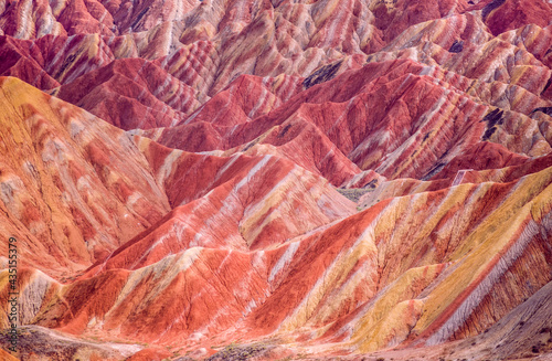 Rainbow Mountains China 
Candy-color mountains—with rippling stripes of cerulean blue, vibrant magenta, canary-yellow, & blood-orange— belong in a fairy tale, but in China, this is a reality. 
 photo
