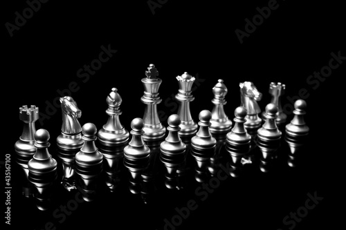 Chess pieces on dark background