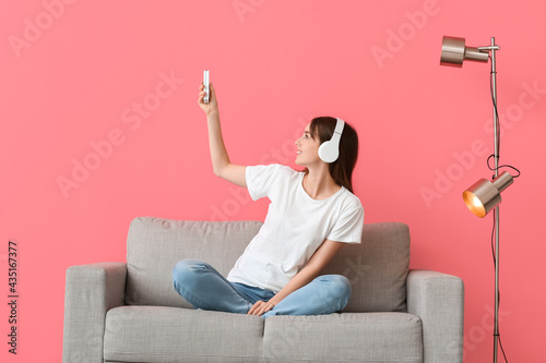 Young woman with air condit...