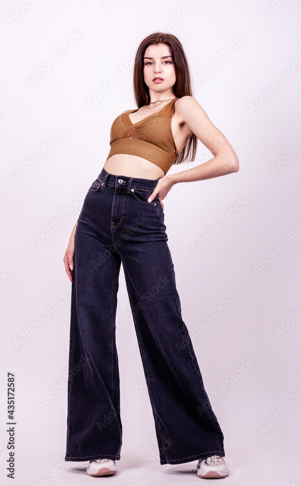 fashion woman white background studio shoot hippy style outfit fashion woman white background studio shoot hippy style outfit