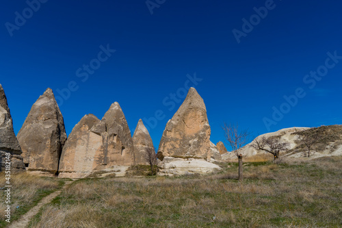 Fairy chimneys and typical rock formations near Göreme, Cappadocia, Turkey
