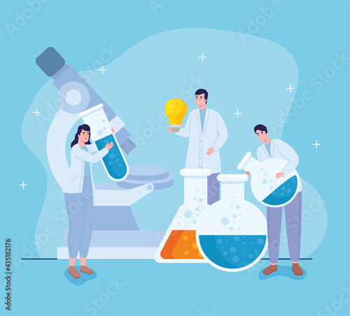 scientists with flasks